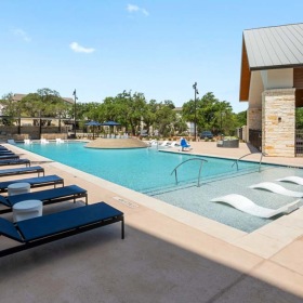 Sparkling Swimming Pool with Lounge Seating Sparkling Swimming Pool with Lounge Seating