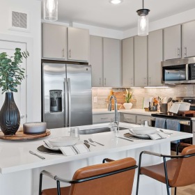 Stainless Steel Appliances, Tile Backsplash, and Granite Countertops